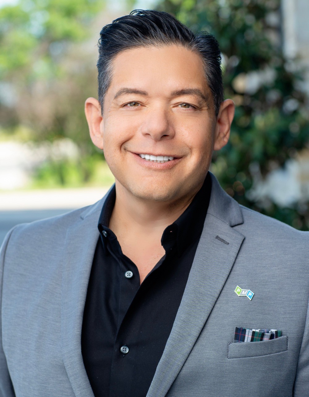 Professional headshot of Louie Ruiz, Strategic Growth Manager at PMP, with over nine years of experience in HOA property management, based in Dallas, Texas.